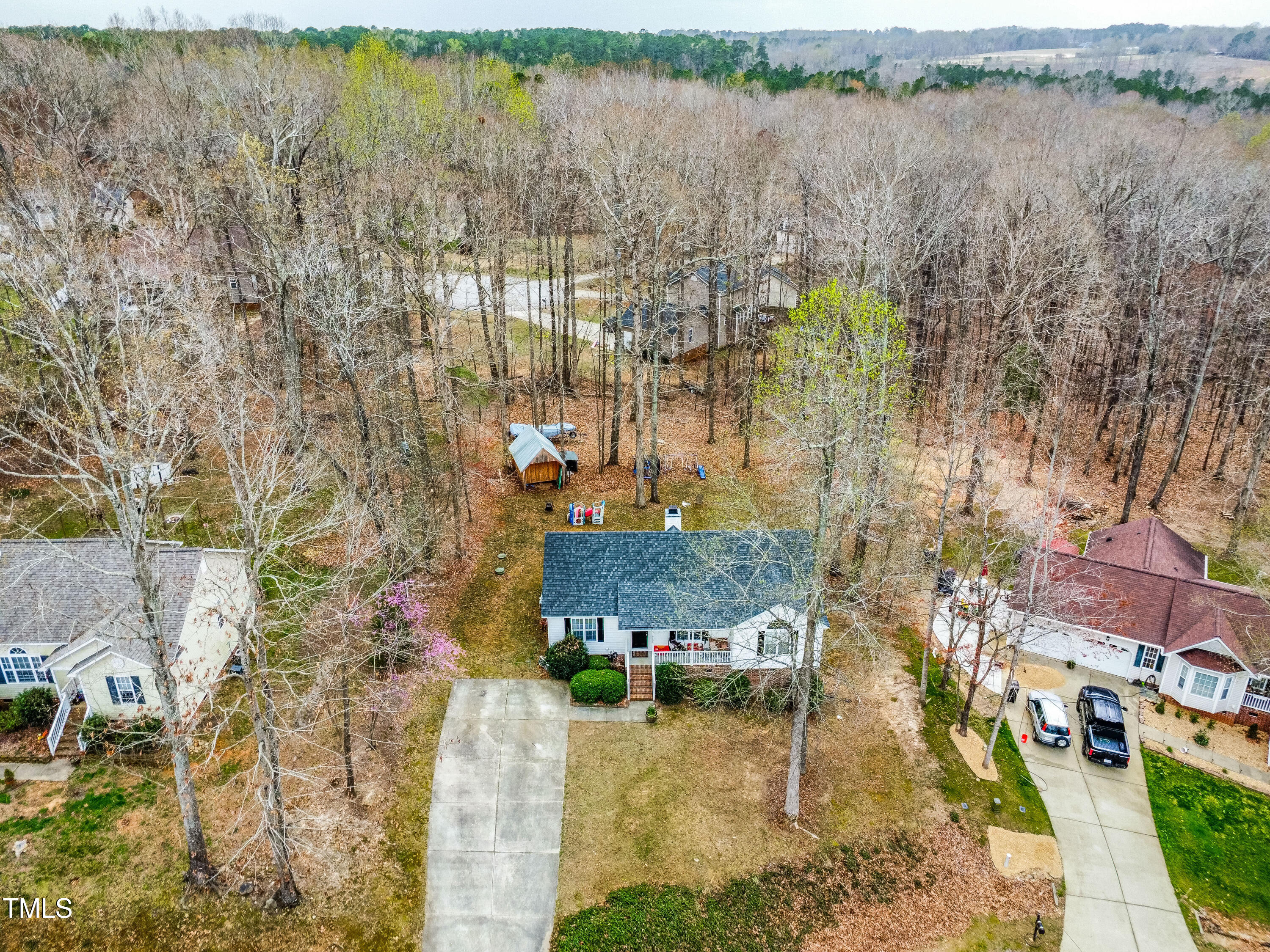 6208 Silver Spring Court Willow Spring, NC 27592 - Photo 2 of 22 dji_fly_20250320_133908_851_174249241098