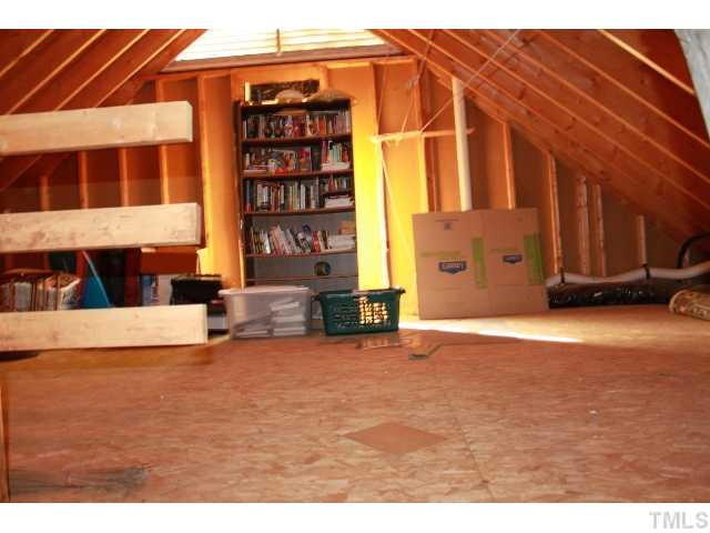 4504 Omni Place Raleigh, NC 27613 - Photo 21 of 25 Walk-Up attic. Permanent Stairs. Lots of storage space! Or can be finished to add more square footage!