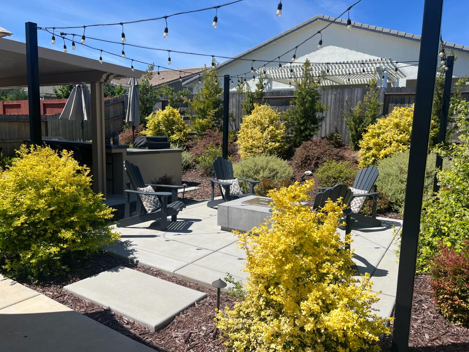 720 Riley Way Lincoln, CA 95648 - Photo 2 of 35 a view of a patio filled with furniture