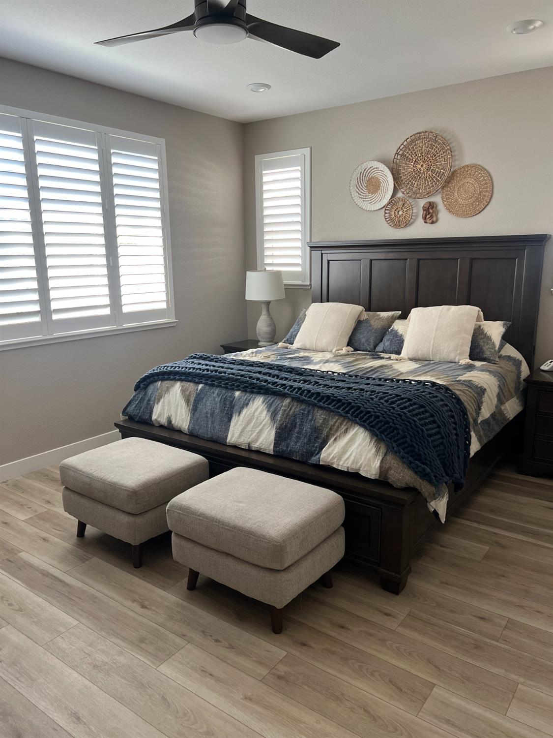 720 Riley Way Lincoln, CA 95648 - Photo 23 of 35 a bedroom with a bed and wooden floor