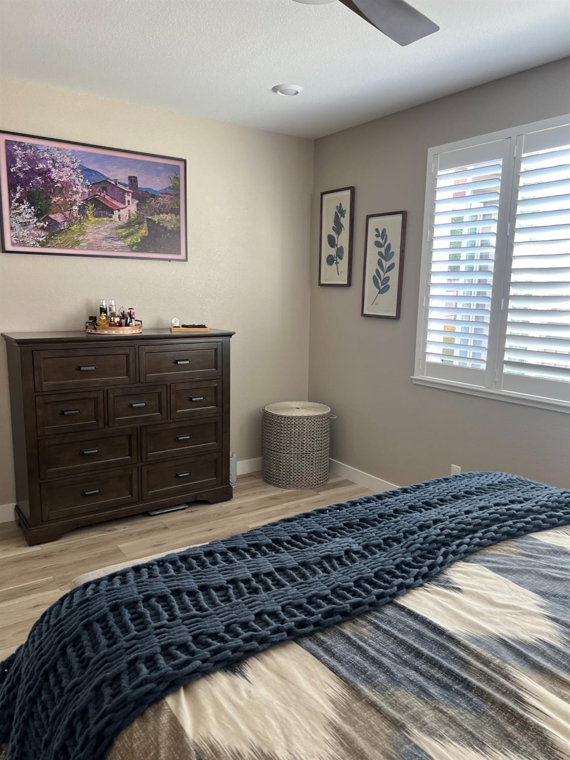 720 Riley Way Lincoln, CA 95648 - Photo 24 of 35 a bedroom with a bed and a cabinet