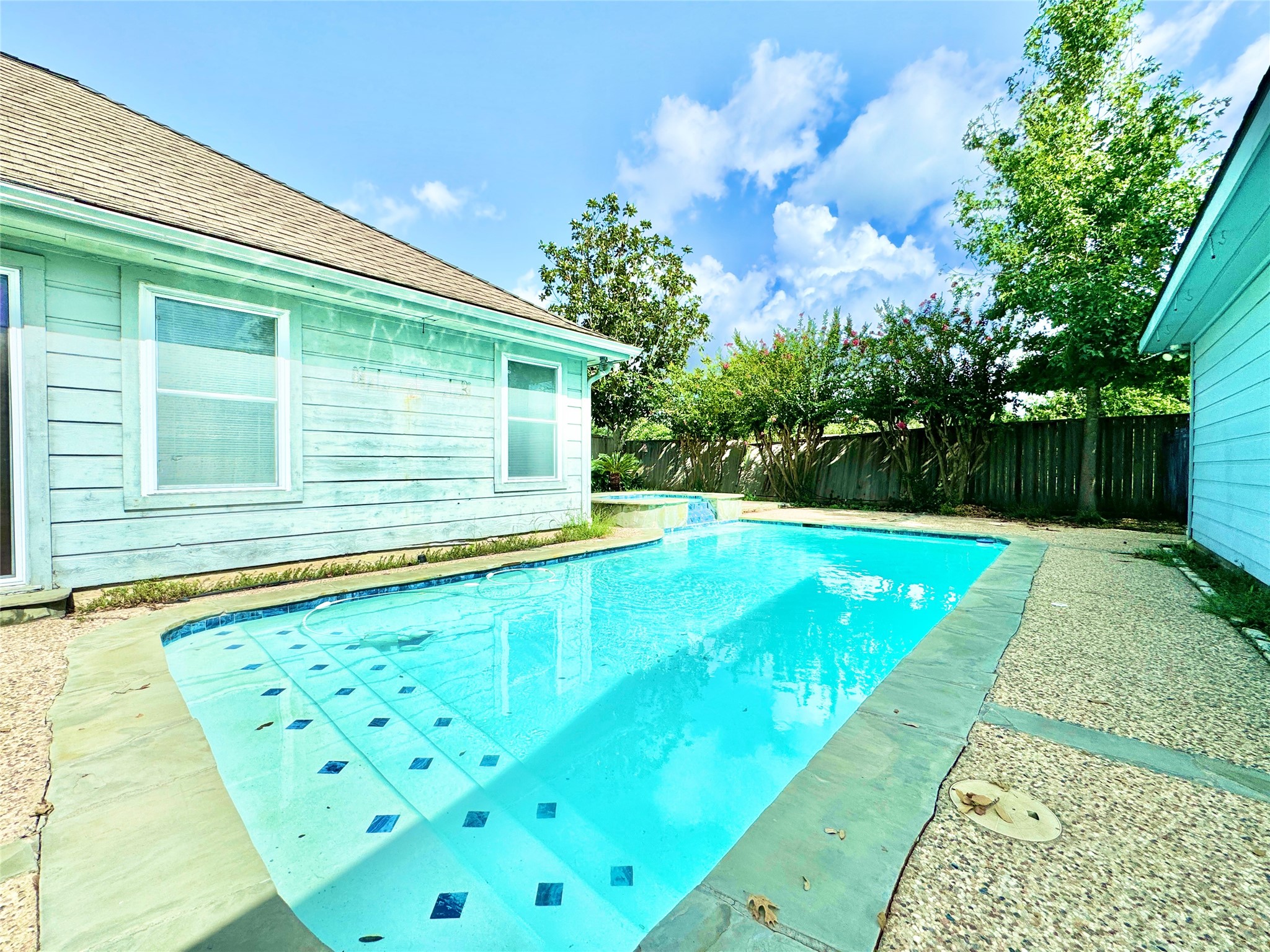 7914 Candle Lane Houston, TX 77071 - Photo 15 of 44 a view of a backyard with a garden