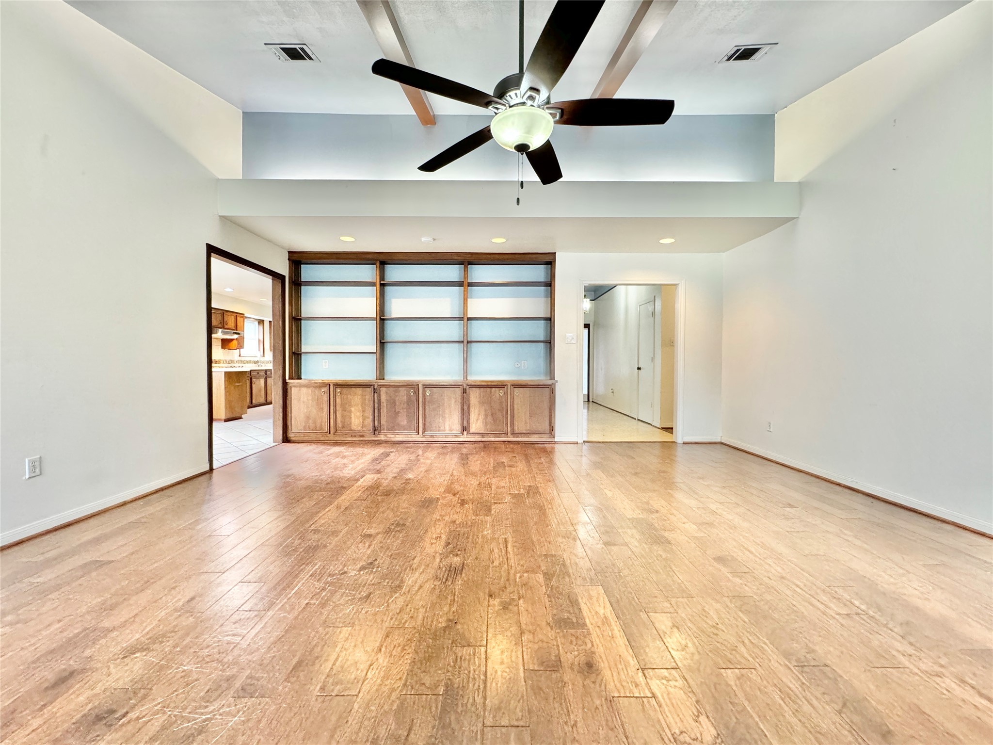 7914 Candle Lane Houston, TX 77071 - Photo 30 of 44 an empty room with wooden floor and windows