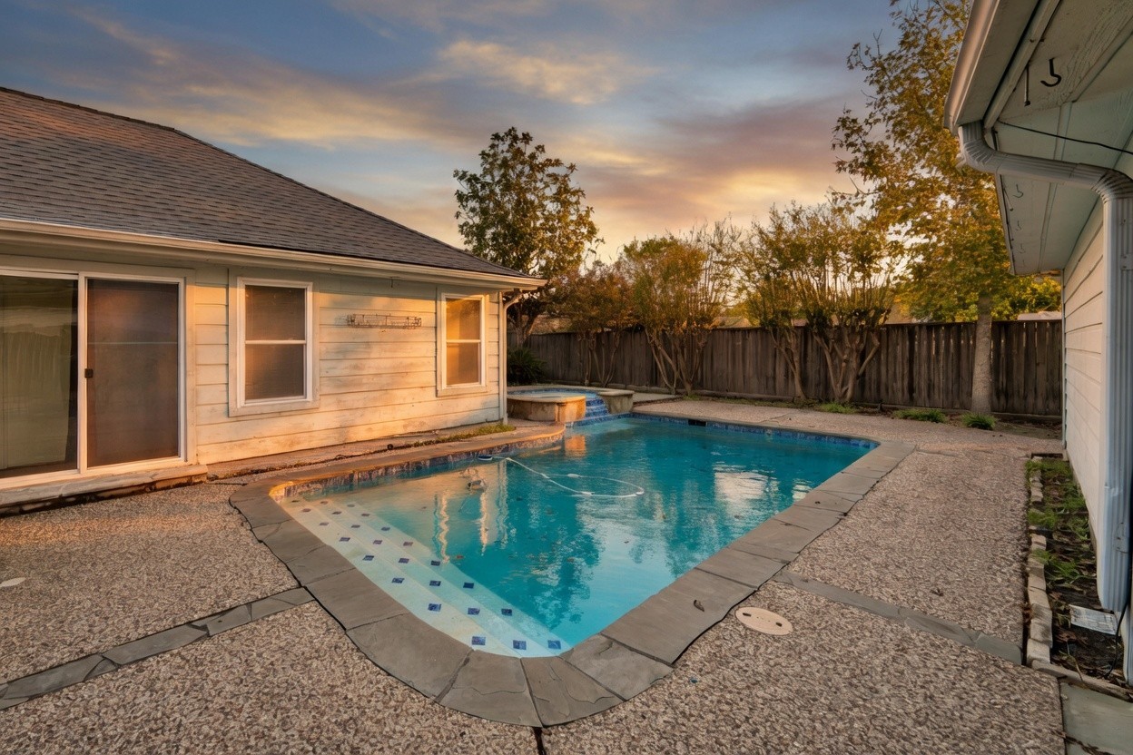 7914 Candle Lane Houston, TX 77071 - Photo 7 of 44 a view of a house with swimming pool in front of it