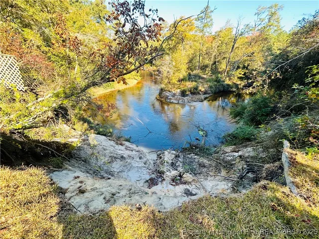 a view of balcony with wooden floor