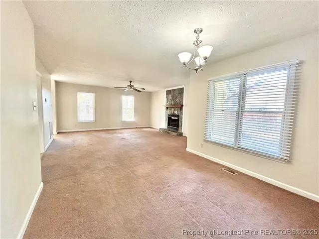 a kitchen with a sink stove and refrigerator