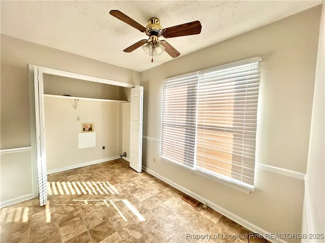 a bathroom with a sink mirror toilet and bathtub