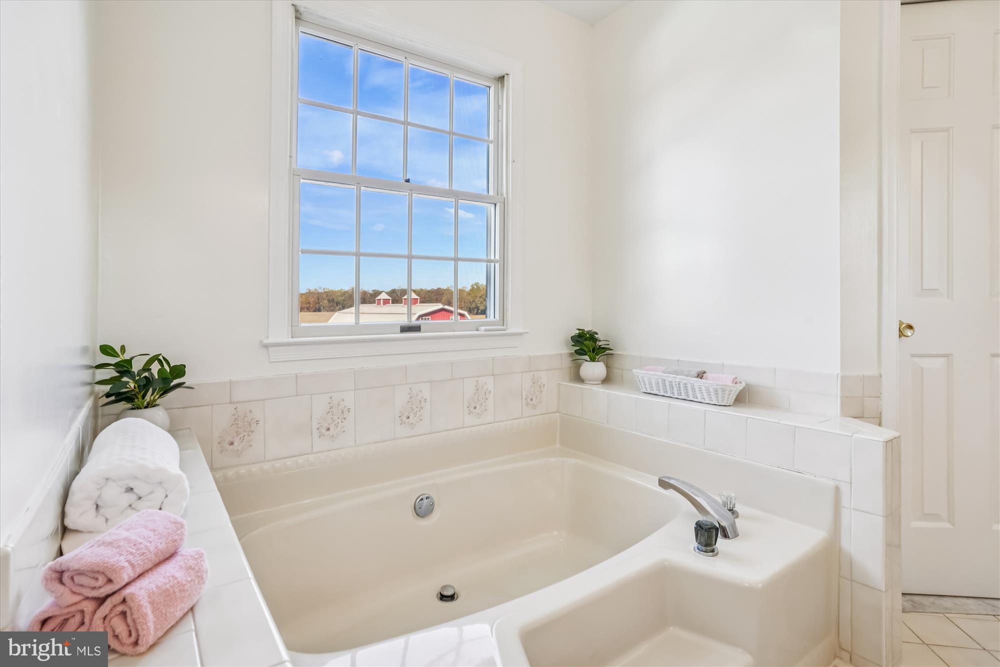 7951 Olivers Shop Road La Plata, MD 20646 - Photo 21 of 32 a bath tub sitting next to a white sink