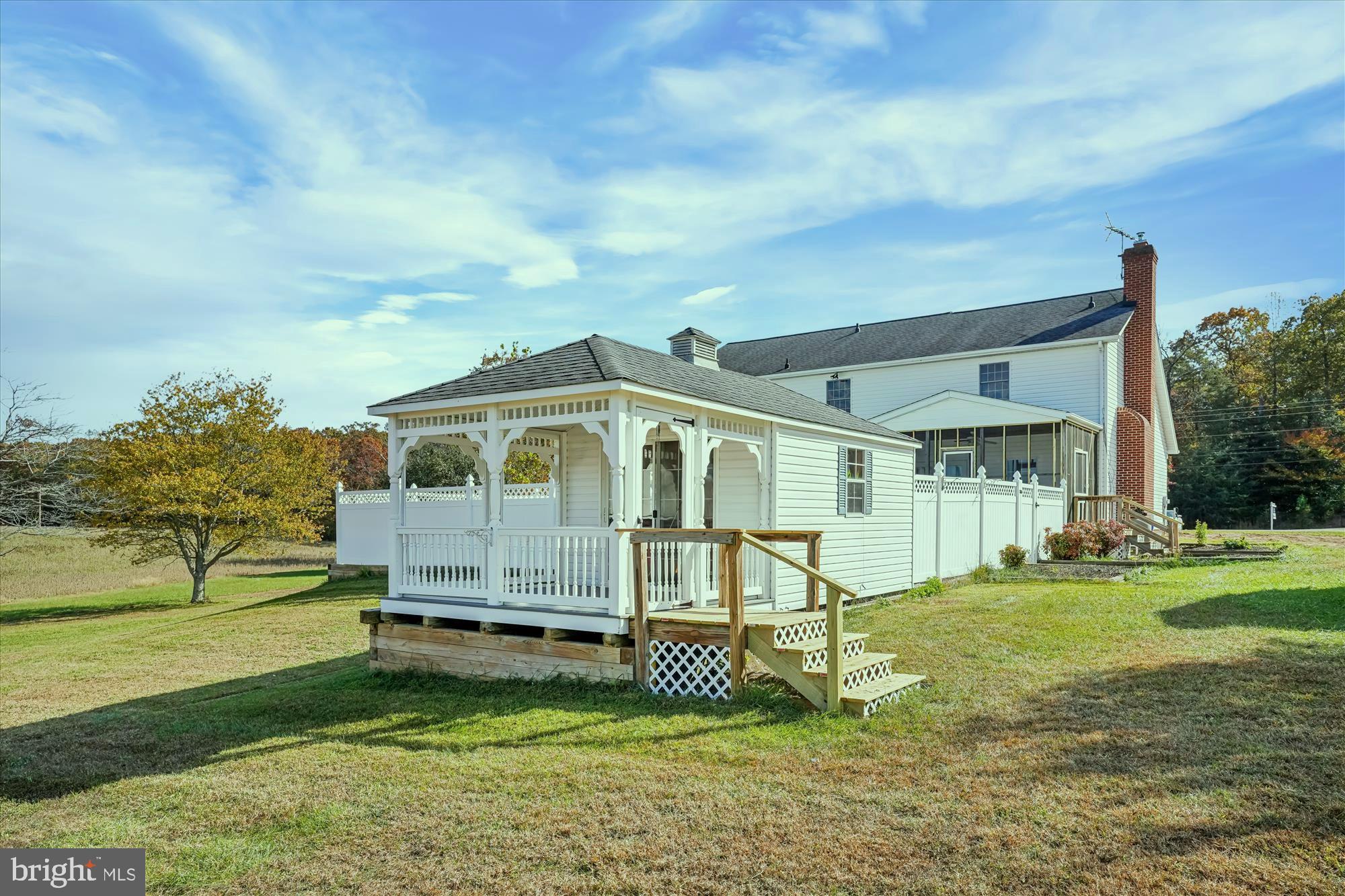 7951 Olivers Shop Road La Plata, MD 20646 - Photo 5 of 32 a front view of a house with a yard