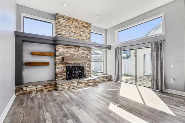 a kitchen with stainless steel appliances a refrigerator and cabinets