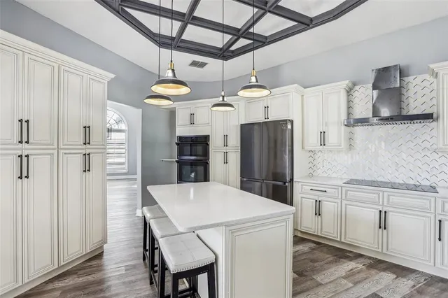 a bathroom with a shower sink and mirror