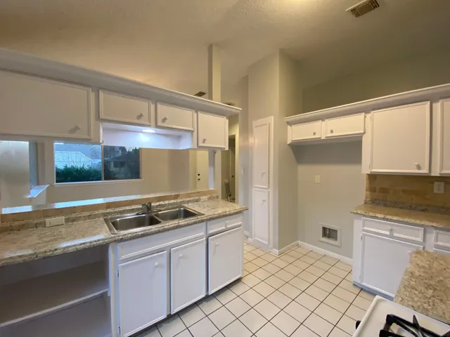 a bathroom with a toilet and a sink