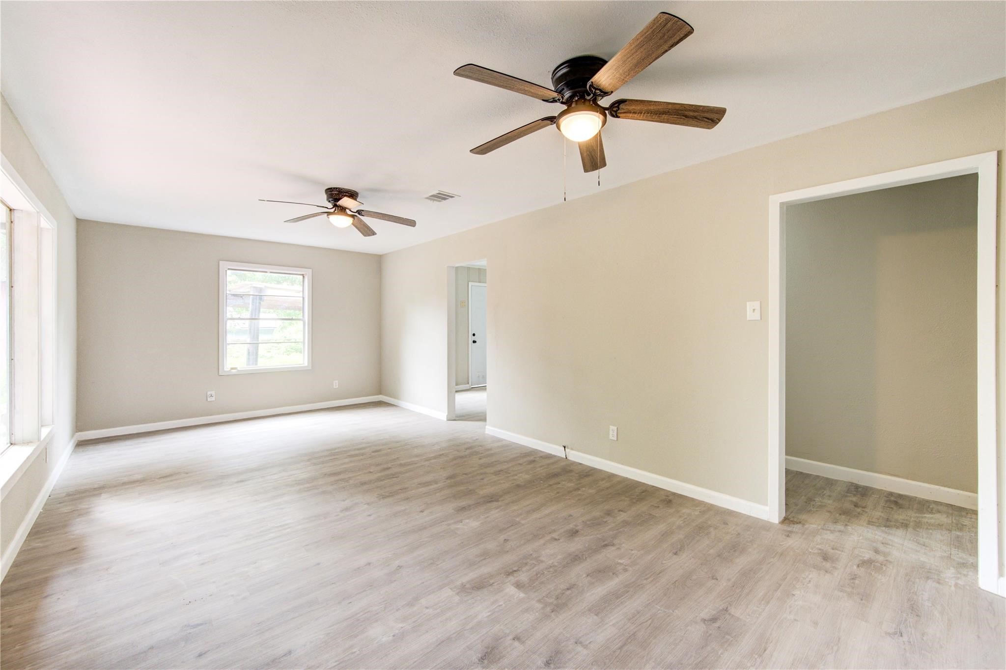 808 State Highway Loop Goodrich, TX 77335 - Photo 15 of 45 a view of an empty room with a window