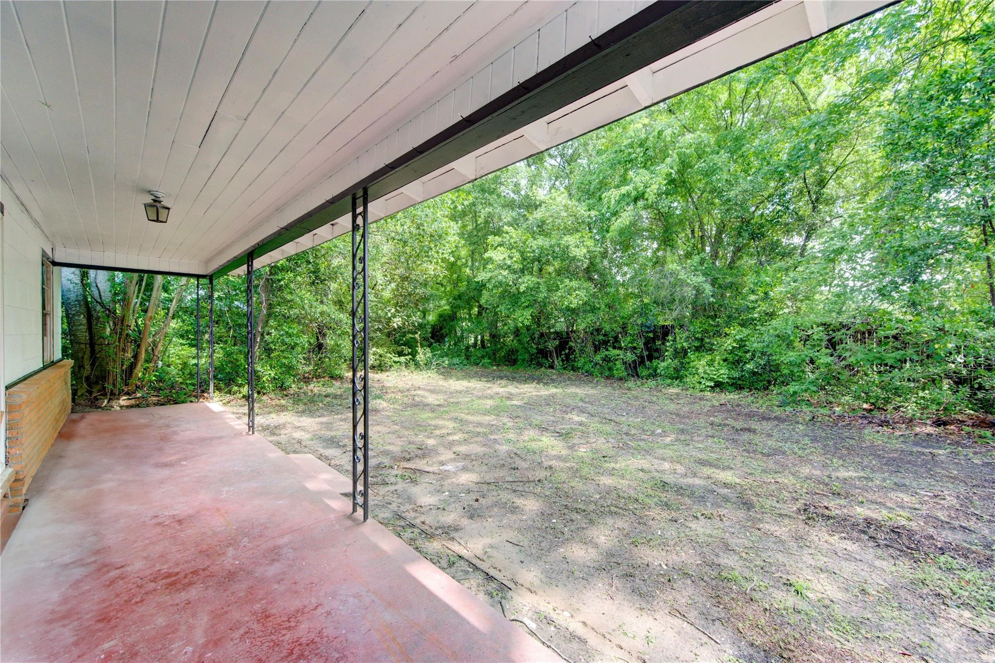 808 State Highway Loop Goodrich, TX 77335 - Photo 4 of 45 a view of a big room with a big yard