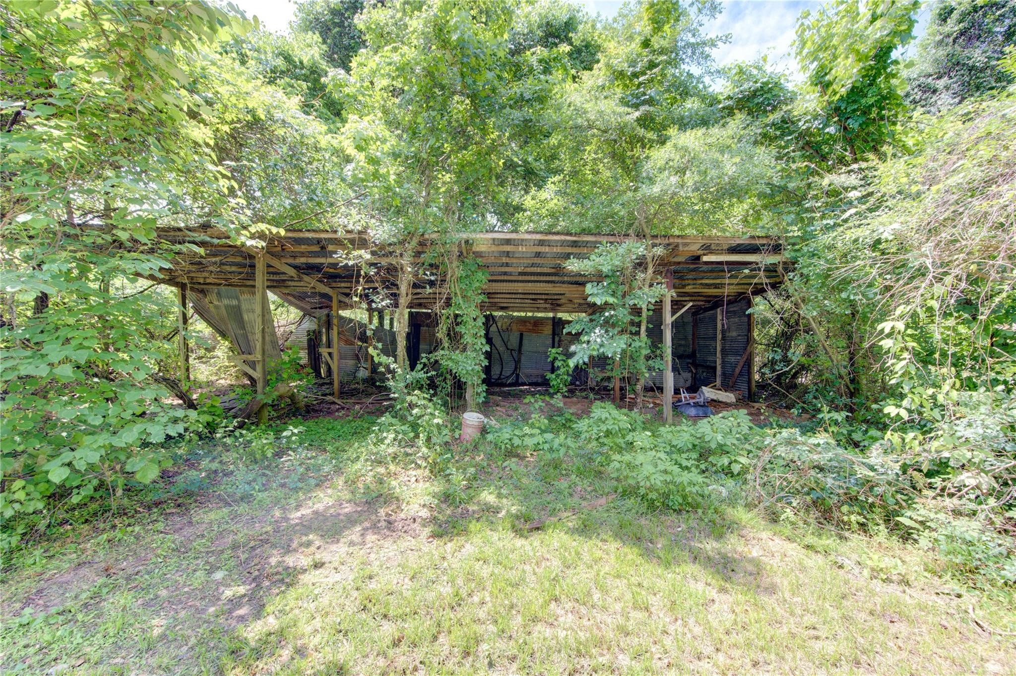 808 State Highway Loop Goodrich, TX 77335 - Photo 45 of 45 a view of a porch with furniture and a yard