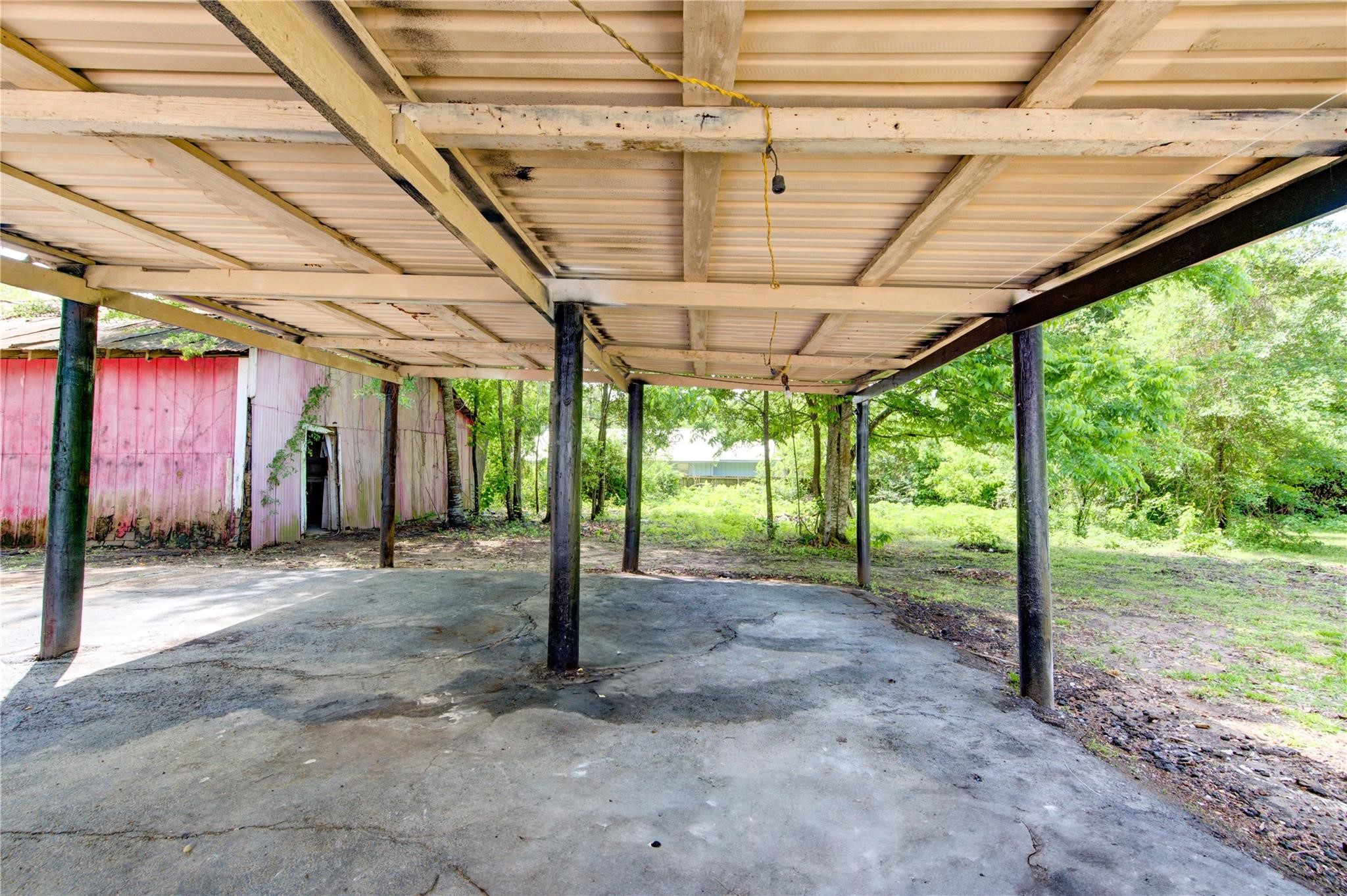 808 State Highway Loop Goodrich, TX 77335 - Photo 6 of 45 a view of a yard with porch
