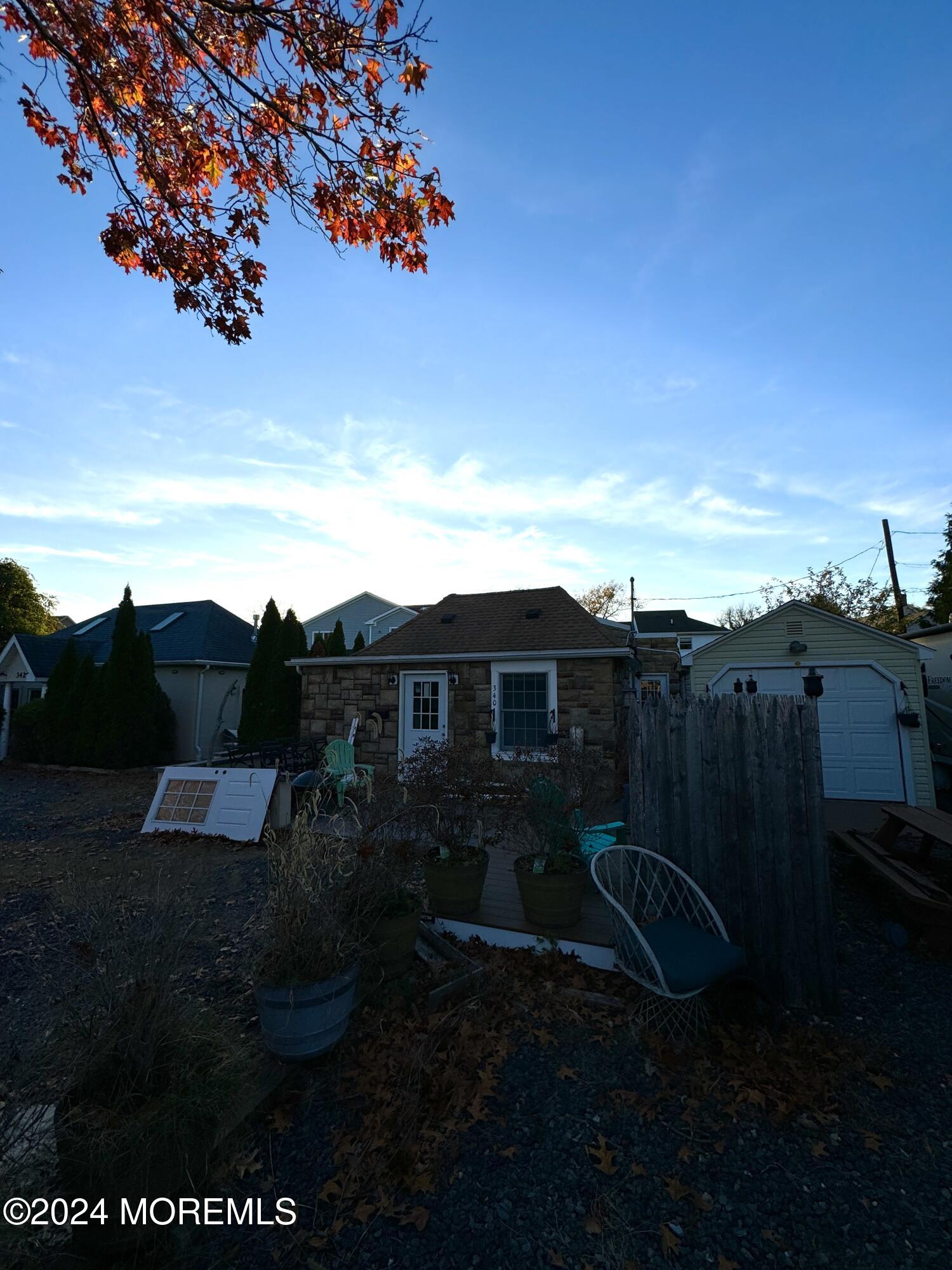 340 Elberon Boulevard, Unit REAR HOUSE Oakhurst, NJ 07755 - Photo 5 of 5 a view of outdoor space and yard