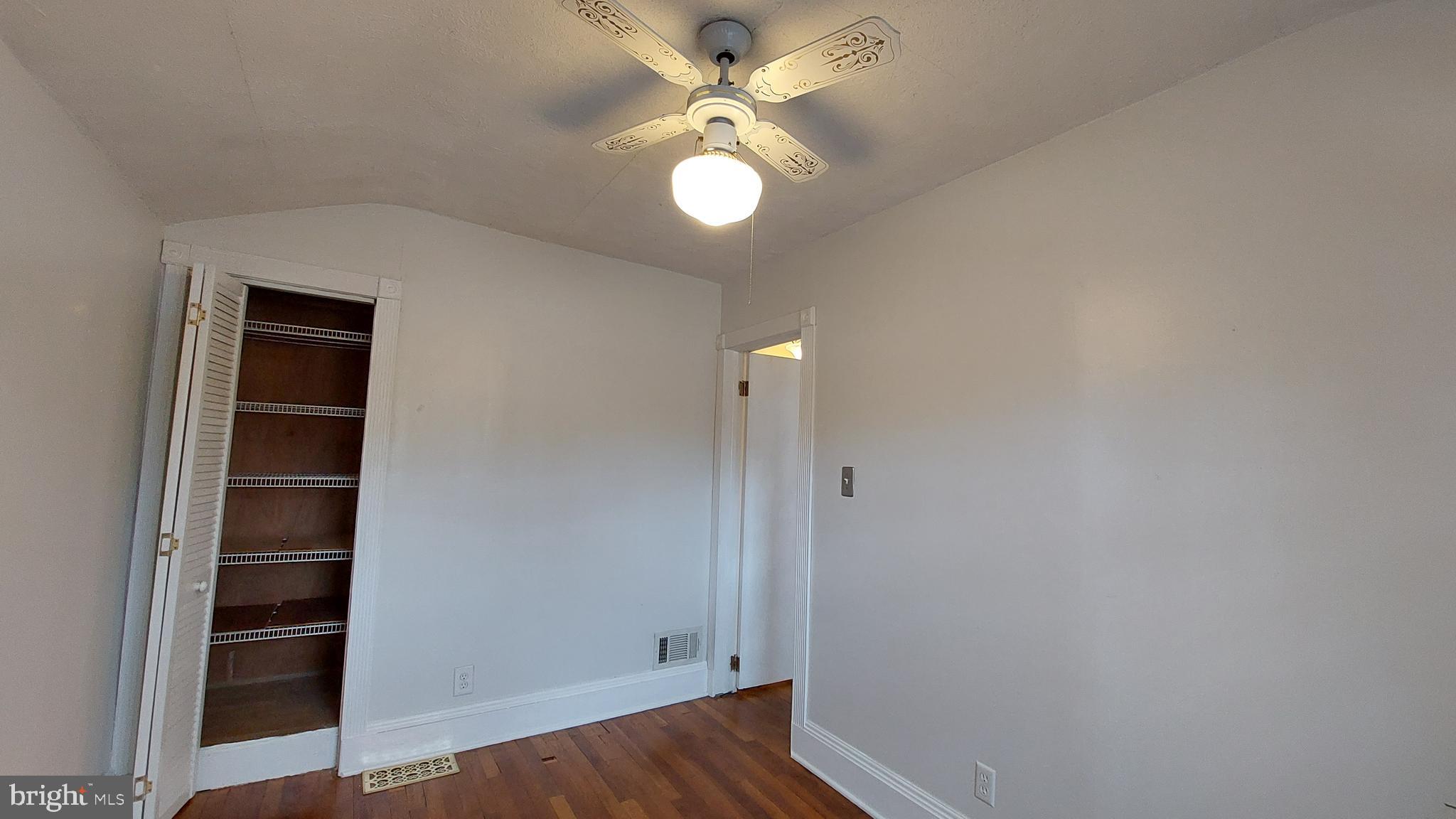 1666 Mussula Road Towson, MD 21286 - Photo 11 of 21 wooden floor in an empty room