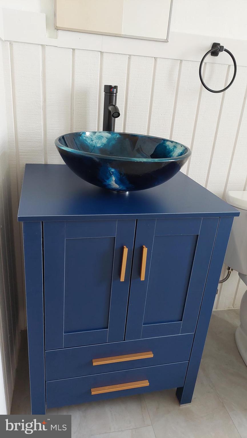 1666 Mussula Road Towson, MD 21286 - Photo 8 of 21 a bathroom with a sink and a mirror