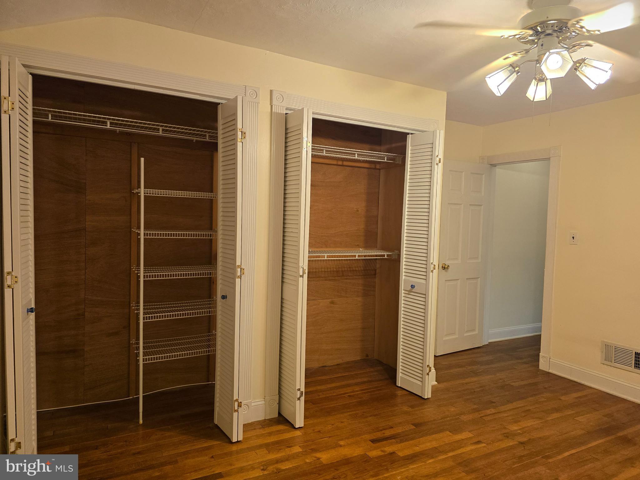 1666 Mussula Road Towson, MD 21286 - Photo 9 of 21 an empty room with wooden floor closet and windows