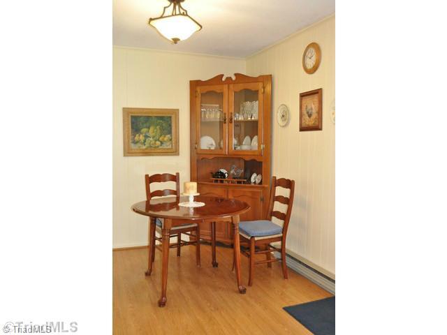 8704 Sweetmeadow Road Colfax, NC 27235 - Photo 7 of 16 Breakfast. Breakfast nook off kitchen.