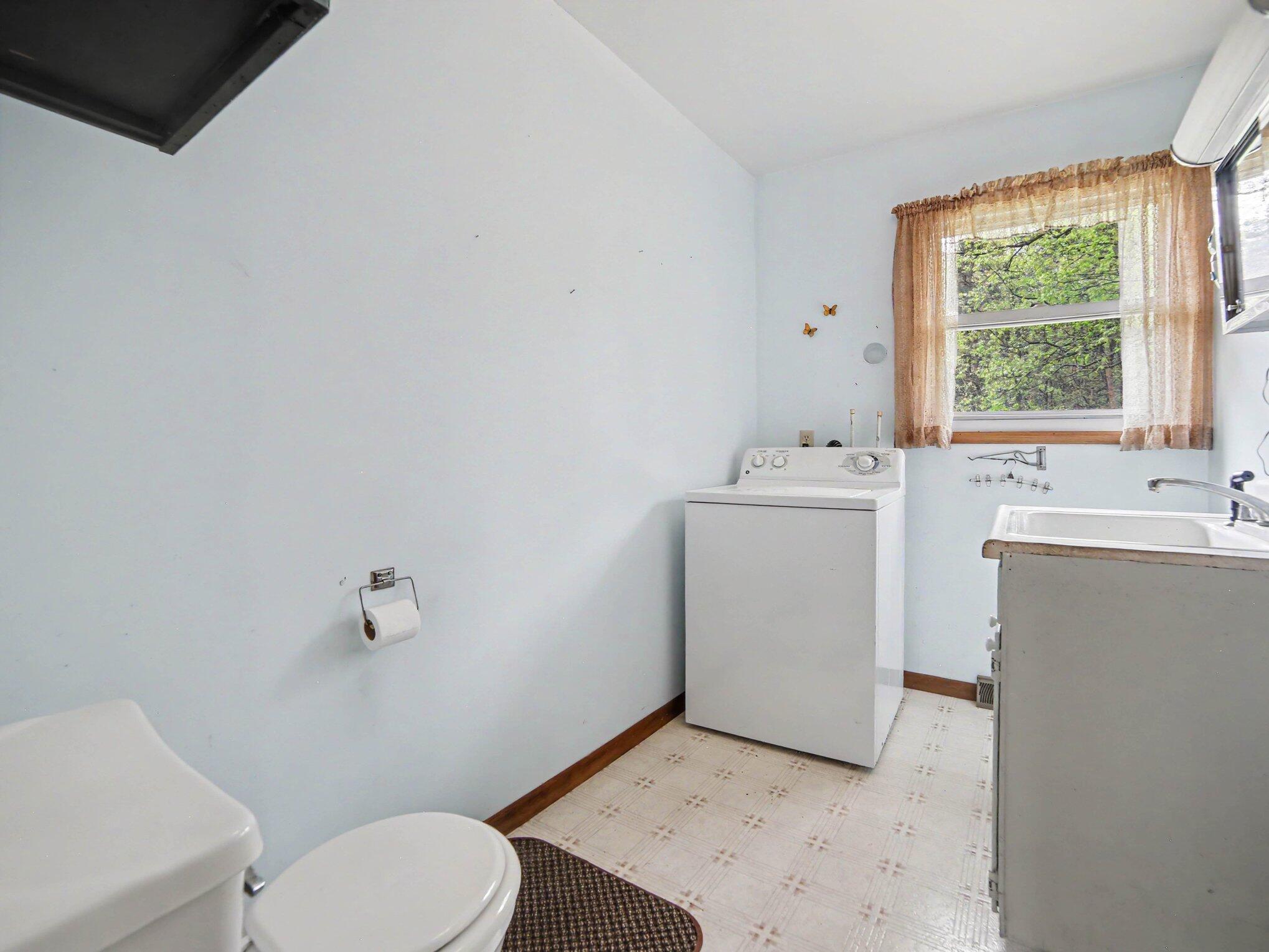 9070 4 Mile Road Hesperia, MI 49421 - Photo 13 of 19 Half Bath and Laundry