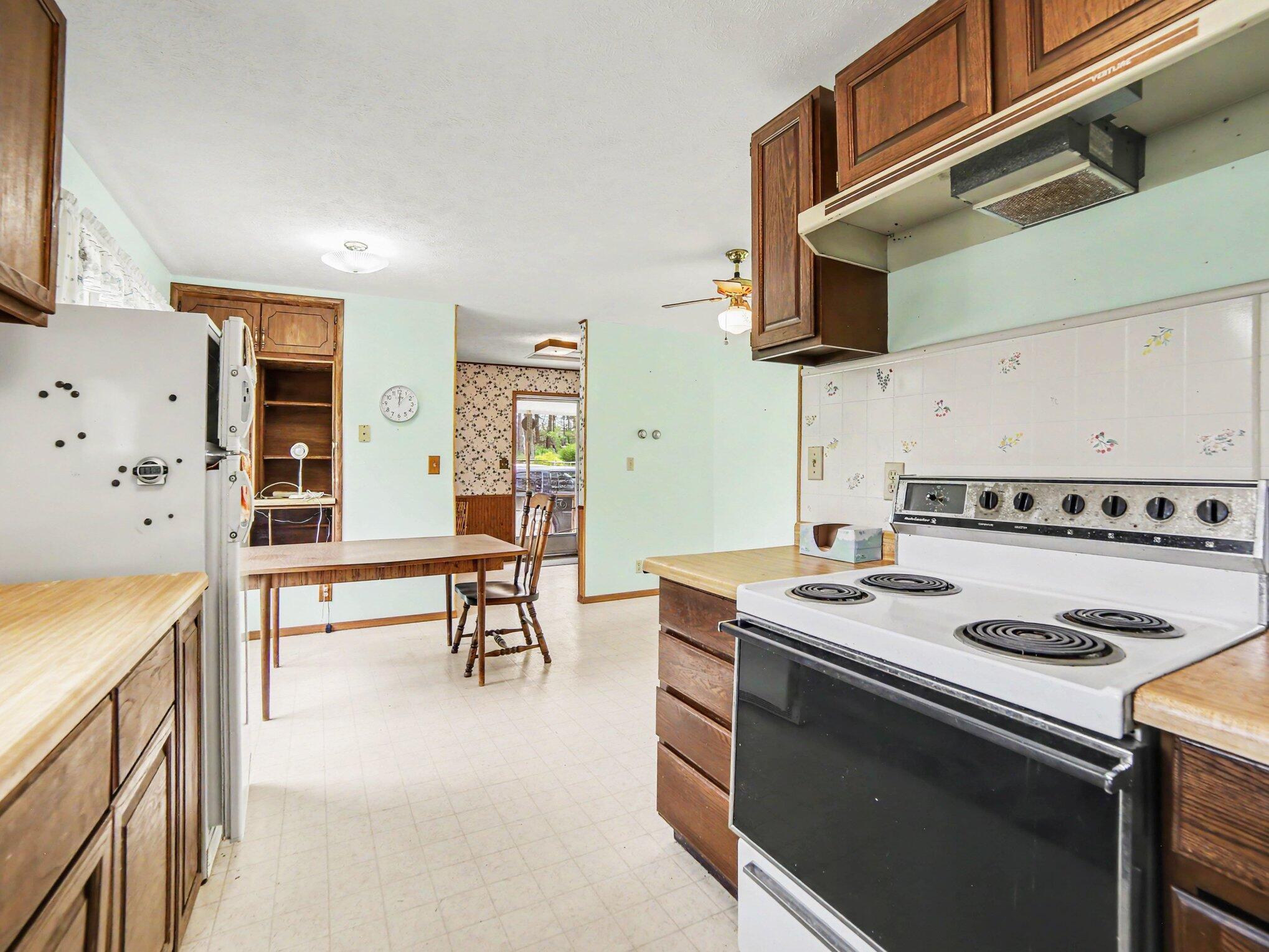 9070 4 Mile Road Hesperia, MI 49421 - Photo 7 of 19 Kitchen into Dining Area