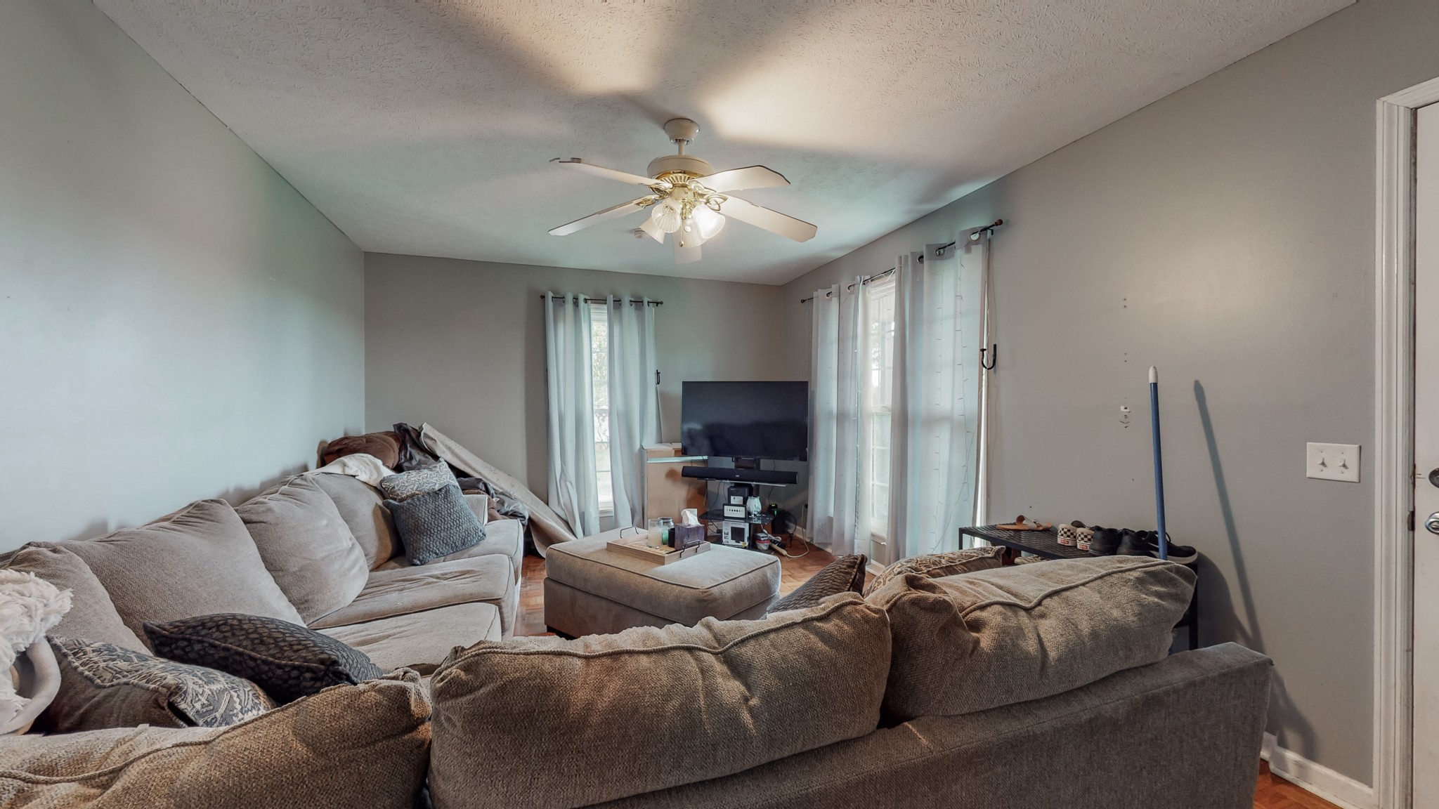 140 Roberts Road Portland, TN 37148 - Photo 18 of 41 a living room with furniture and a flat screen tv