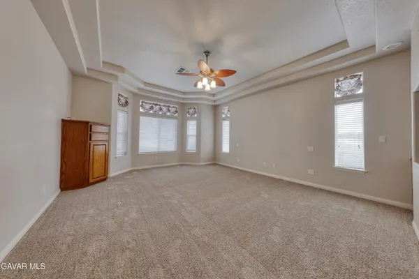 a bathroom with a sink a vanity and a mirror