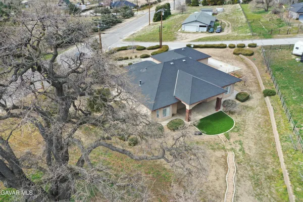 a view of a yard with mountain