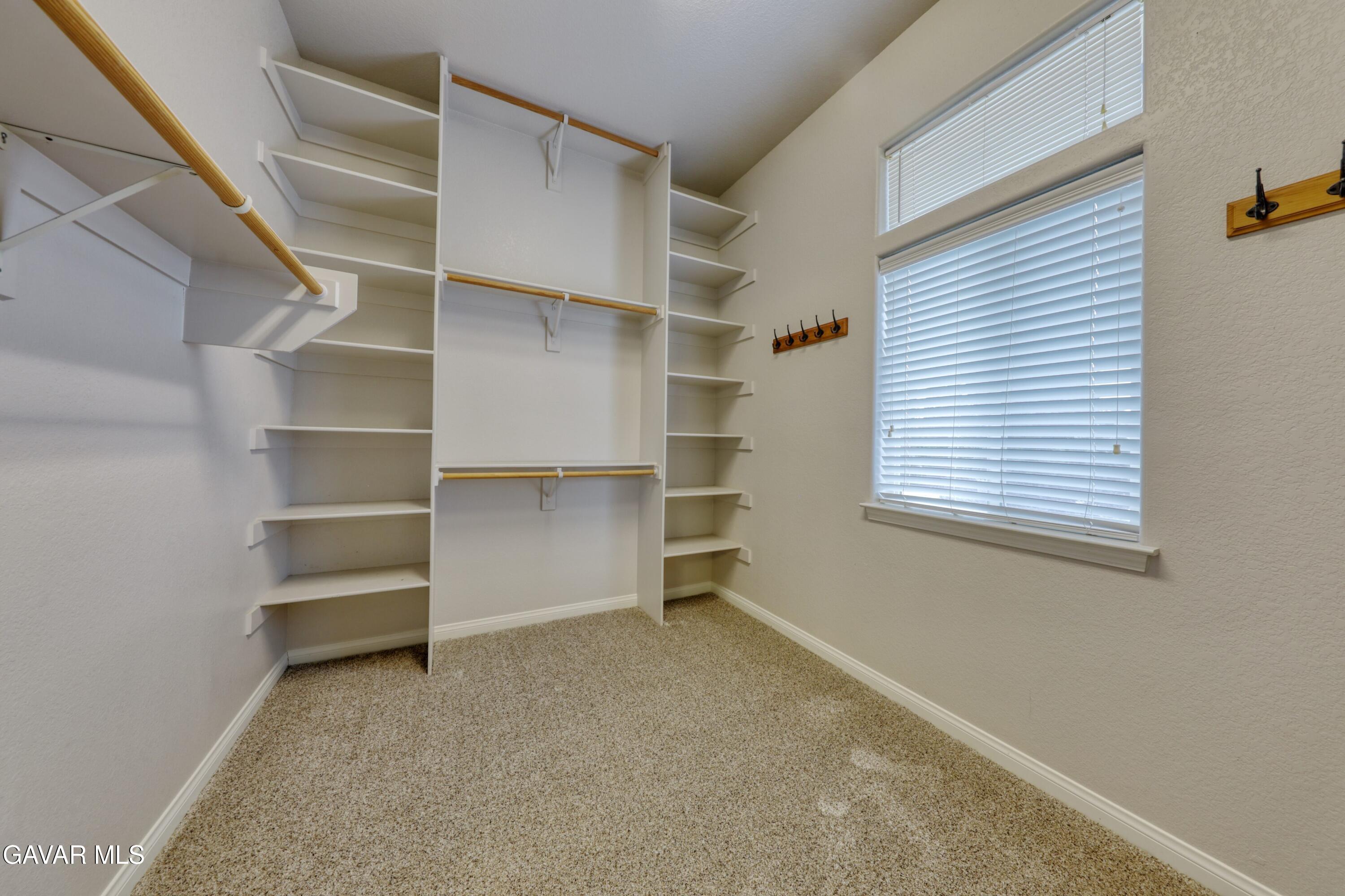 23780 Coyote Court Tehachapi, CA 93561 - Photo 32 of 48 a room with walk in closet and a window