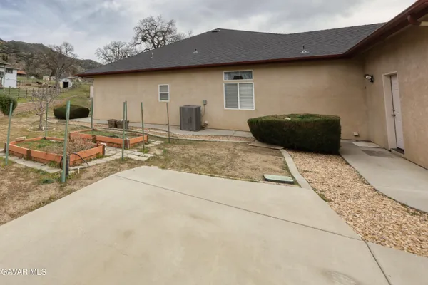a view of a hallway with a kitchen