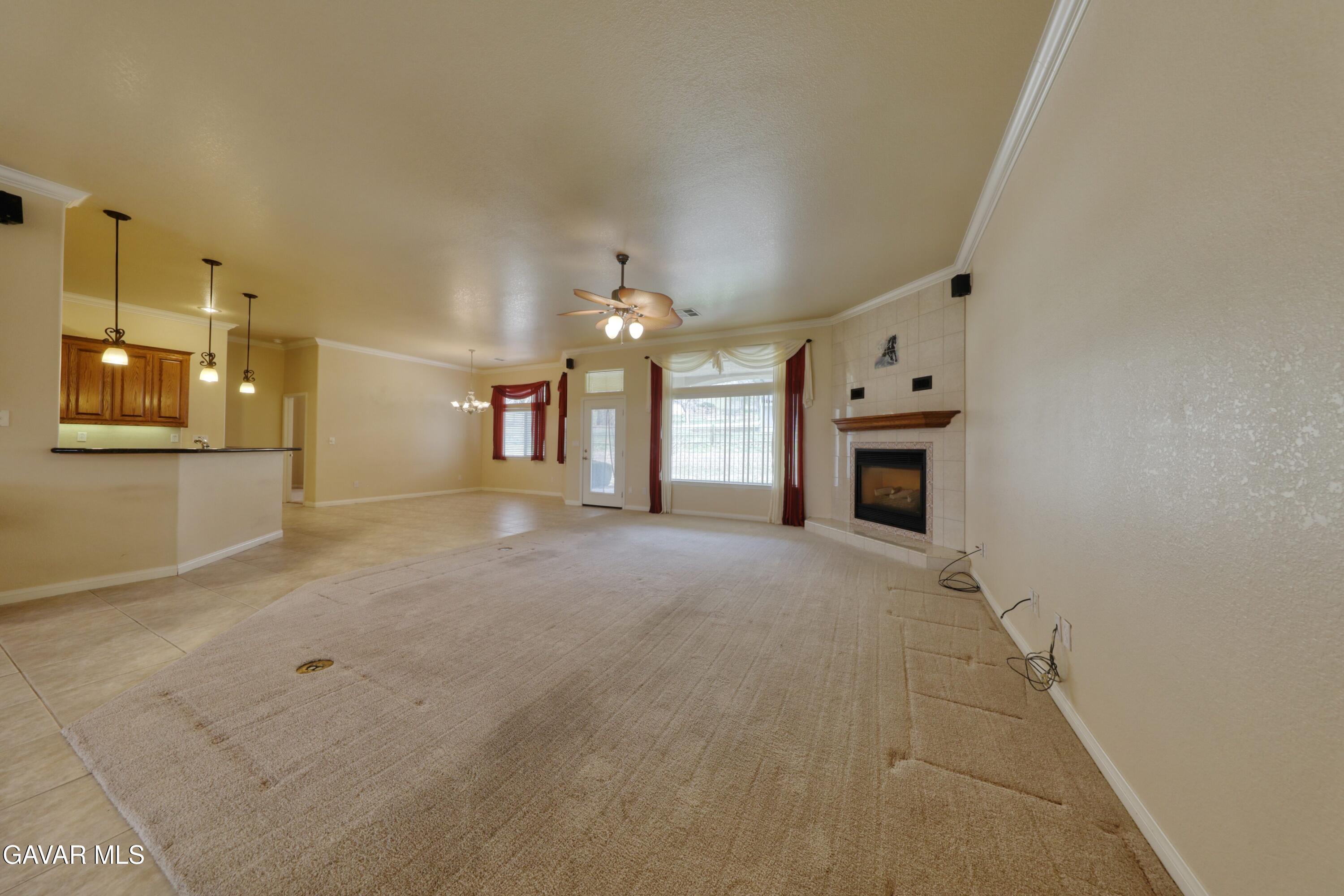 23780 Coyote Court Tehachapi, CA 93561 - Photo 10 of 48 a view of a hallway with a kitchen