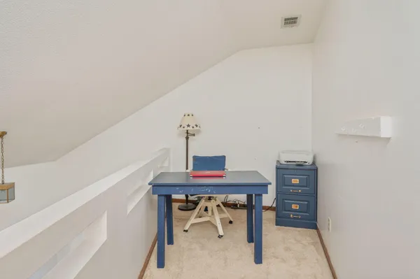 a view of workspace with furniture