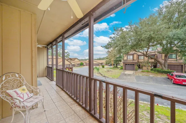 a view of a porch with furniture