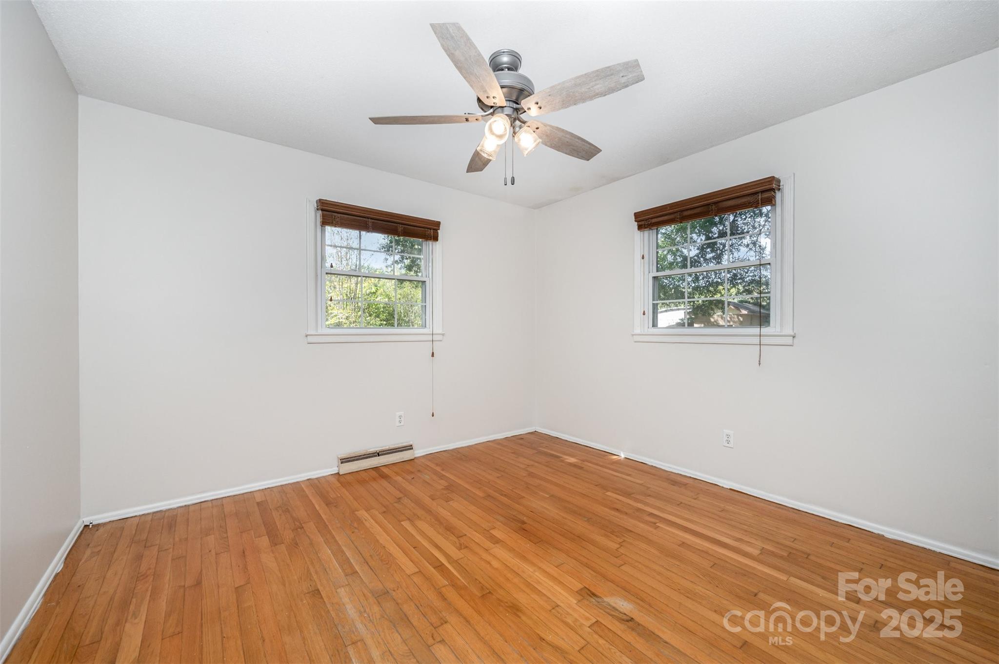 1324 Jefferson Street Lancaster, SC 29720 - Photo 8 of 16 a view of empty room with wooden floor