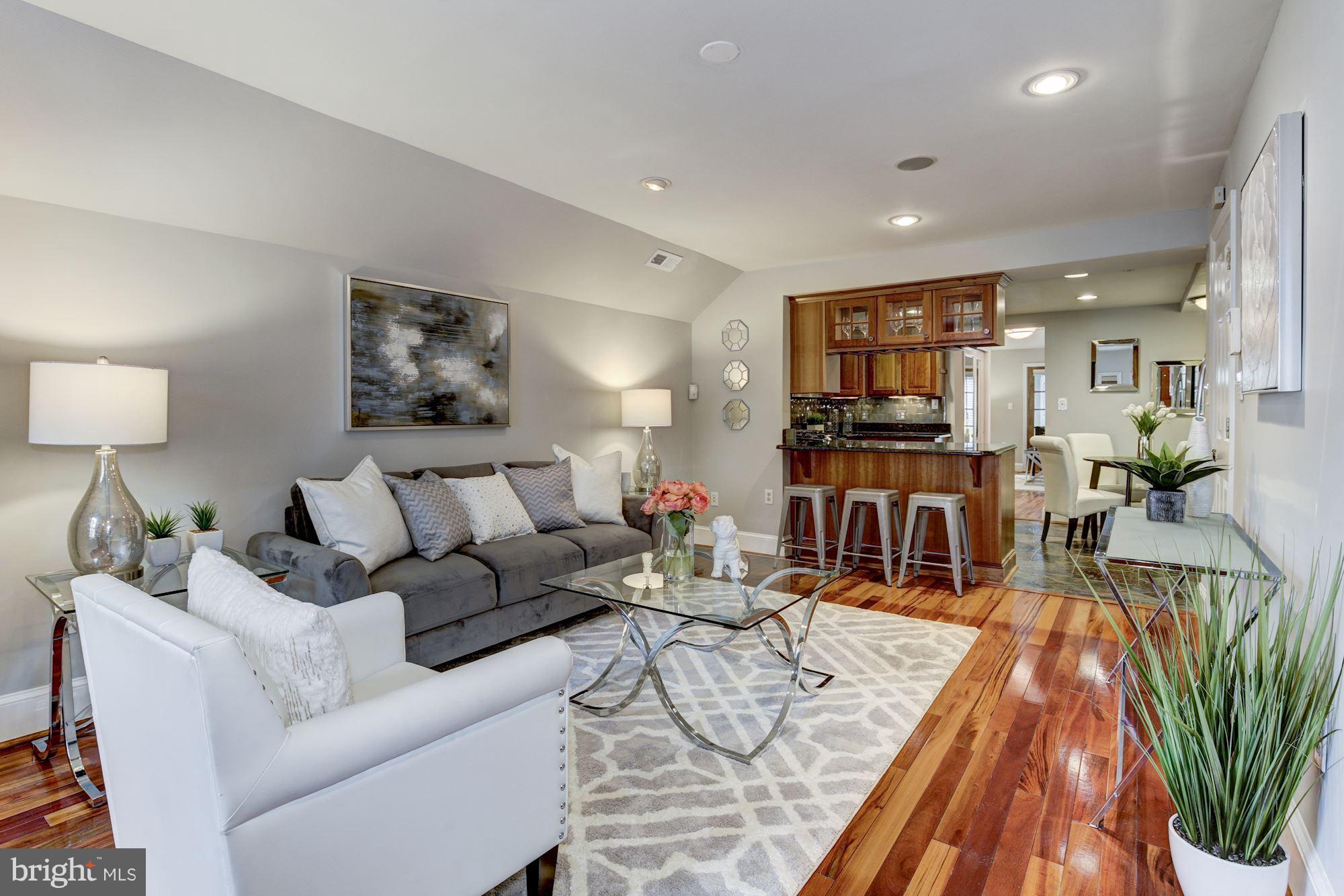 427 Ridge Street Northwest Washington, DC 20001 - Photo 2 of 18 Spacious living room open to kitchen