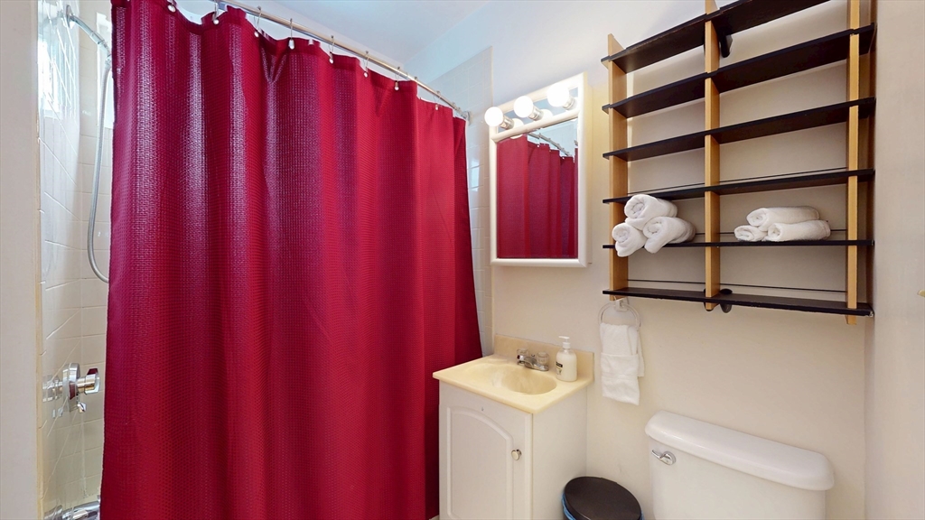 29 Montgomery Street, Unit 2 Cambridge, MA 02140 - Photo 7 of 8 a view of a utility room with washer and dryer