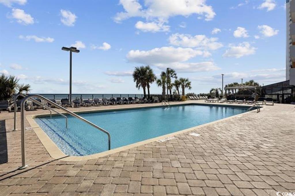 1501 South Ocean Boulevard, Unit 730 Myrtle Beach, SC 29577 - Photo 5 of 13 Community pool with a patio area