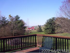 656 Battlefield Road New Hope, VA 24437 - Photo 3 of 12 a view of balcony with wooden floor and fence