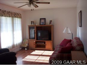 656 Battlefield Road New Hope, VA 24437 - Photo 5 of 12 a living room with furniture and a flat screen tv