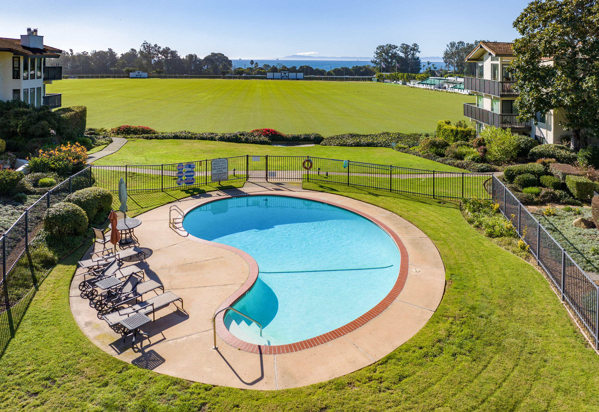 3375 Foothill Road, Unit 632 Carpinteria, CA 93013 - Photo 14 of 16 a view of a swimming pool with an ocean