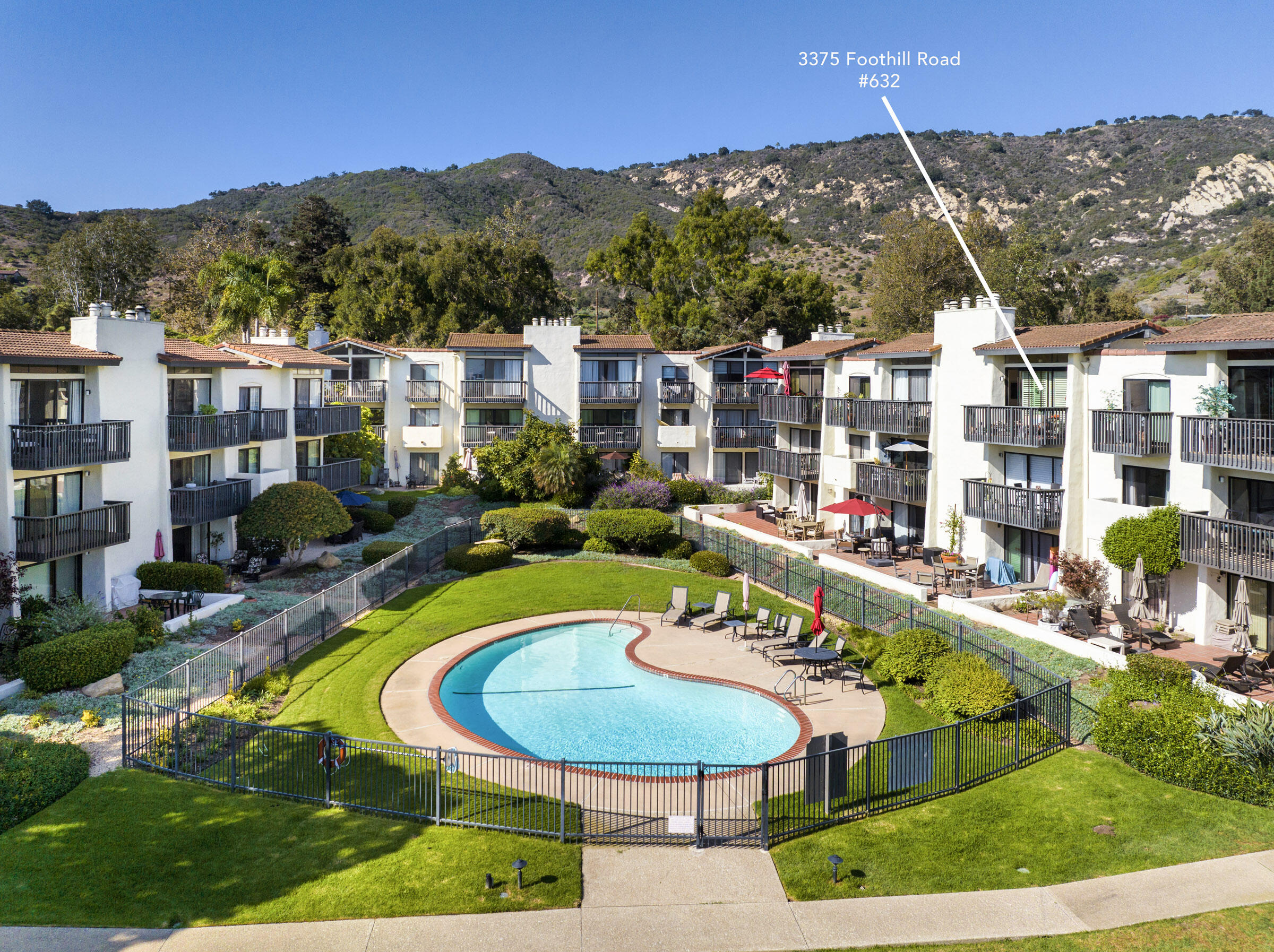 3375 Foothill Road, Unit 632 Carpinteria, CA 93013 - Photo 3 of 16 a view of a swimming pool and a chairs
