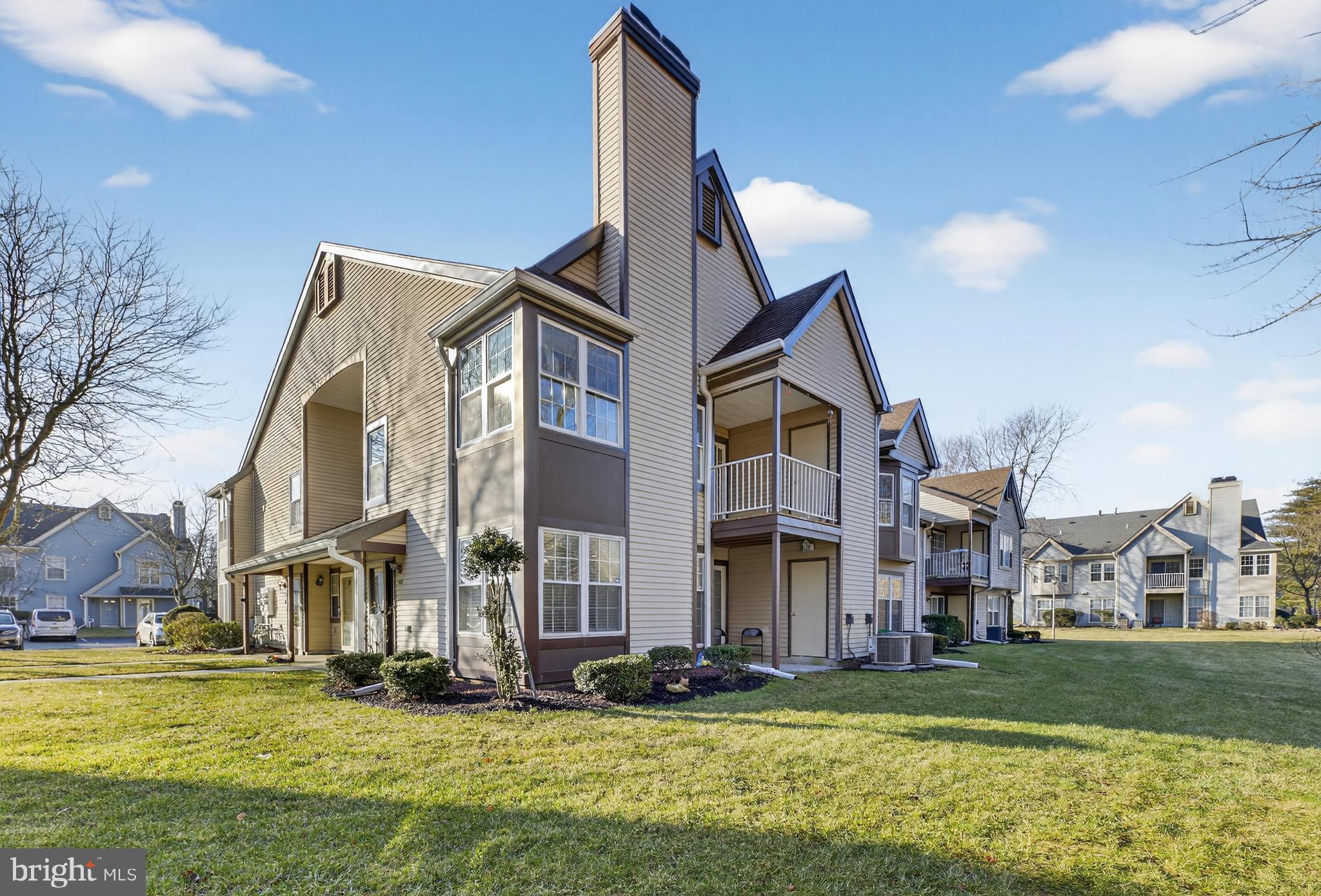 133 Andover Place Robbinsville, NJ 08691 - Photo 2 of 20 a view of a big house with a yard