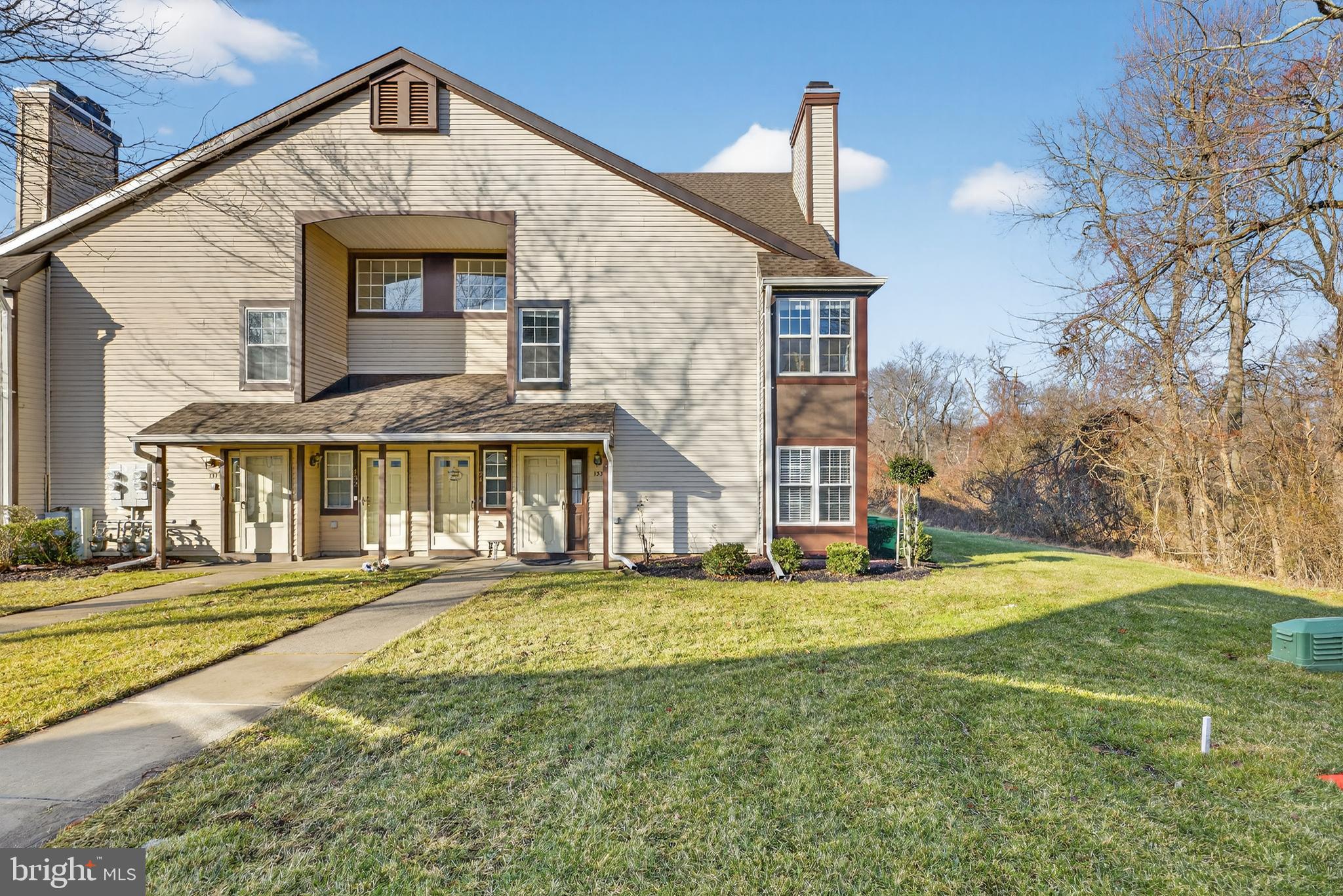 133 Andover Place Robbinsville, NJ 08691 - Photo 3 of 20 a front view of a house with a yard