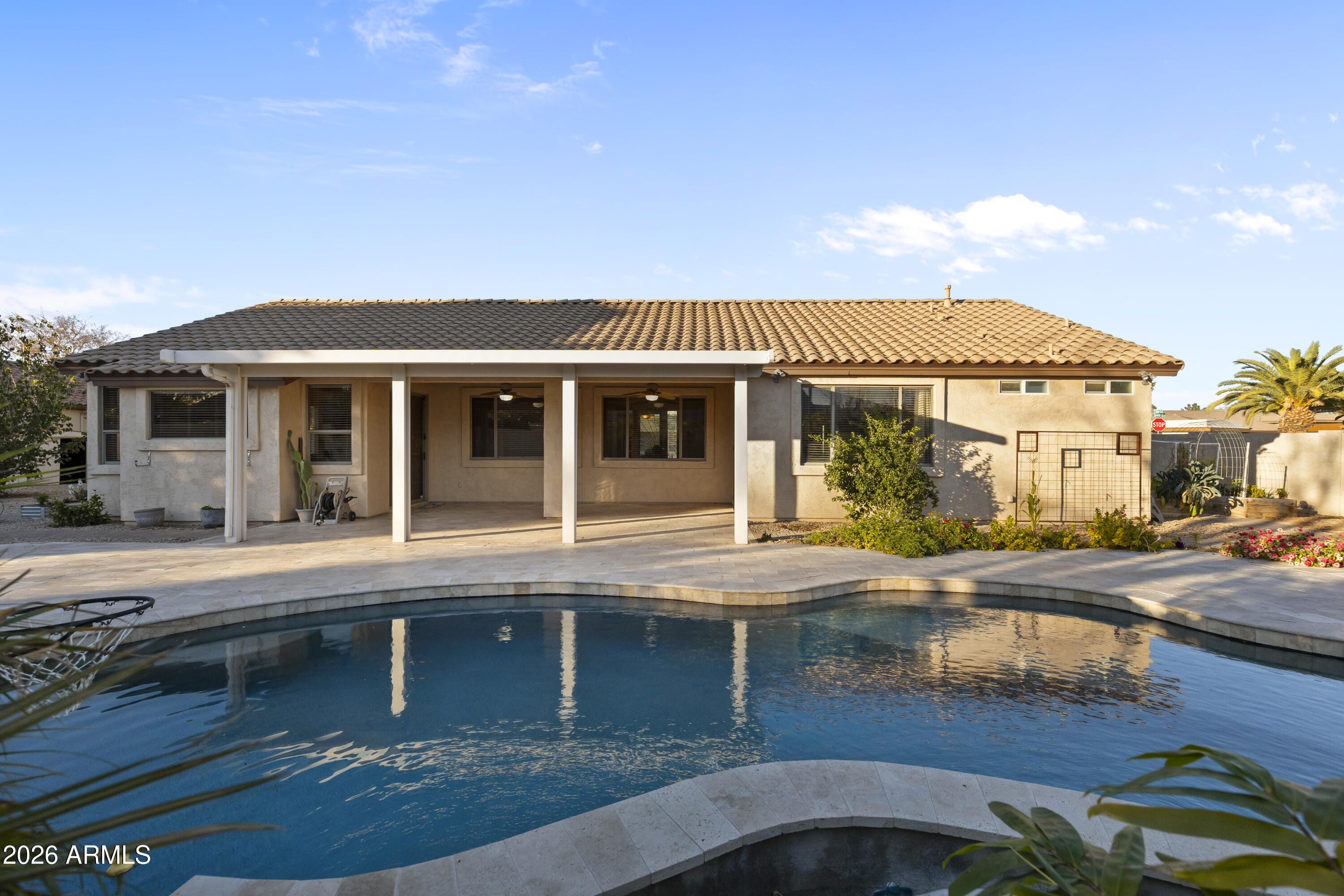 2519 East Rawhide Street Gilbert, AZ 85296 - Photo 22 of 35 a front view of a house with garden