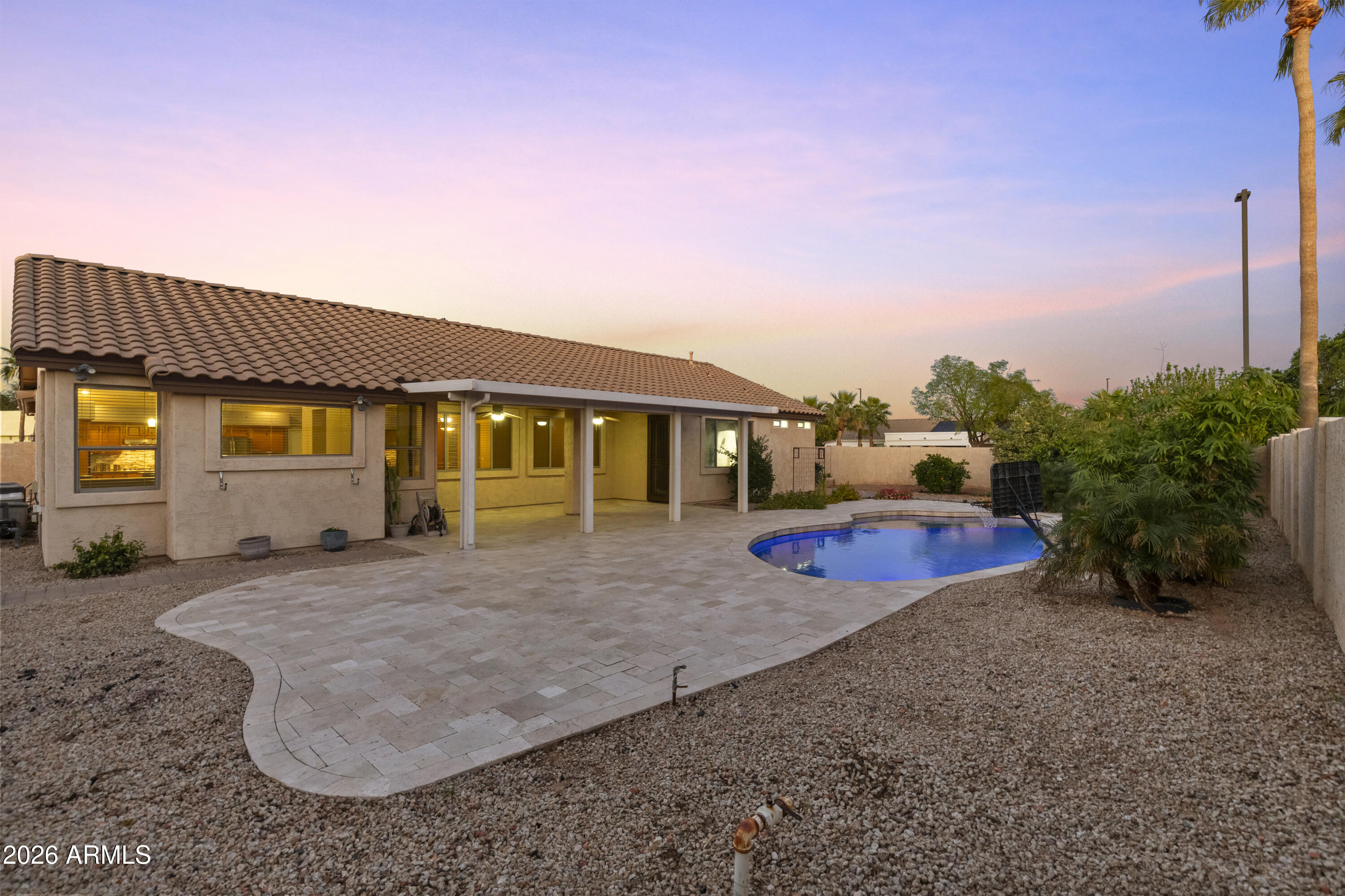 2519 East Rawhide Street Gilbert, AZ 85296 - Photo 24 of 35 a view of a house with backyard and sitting area