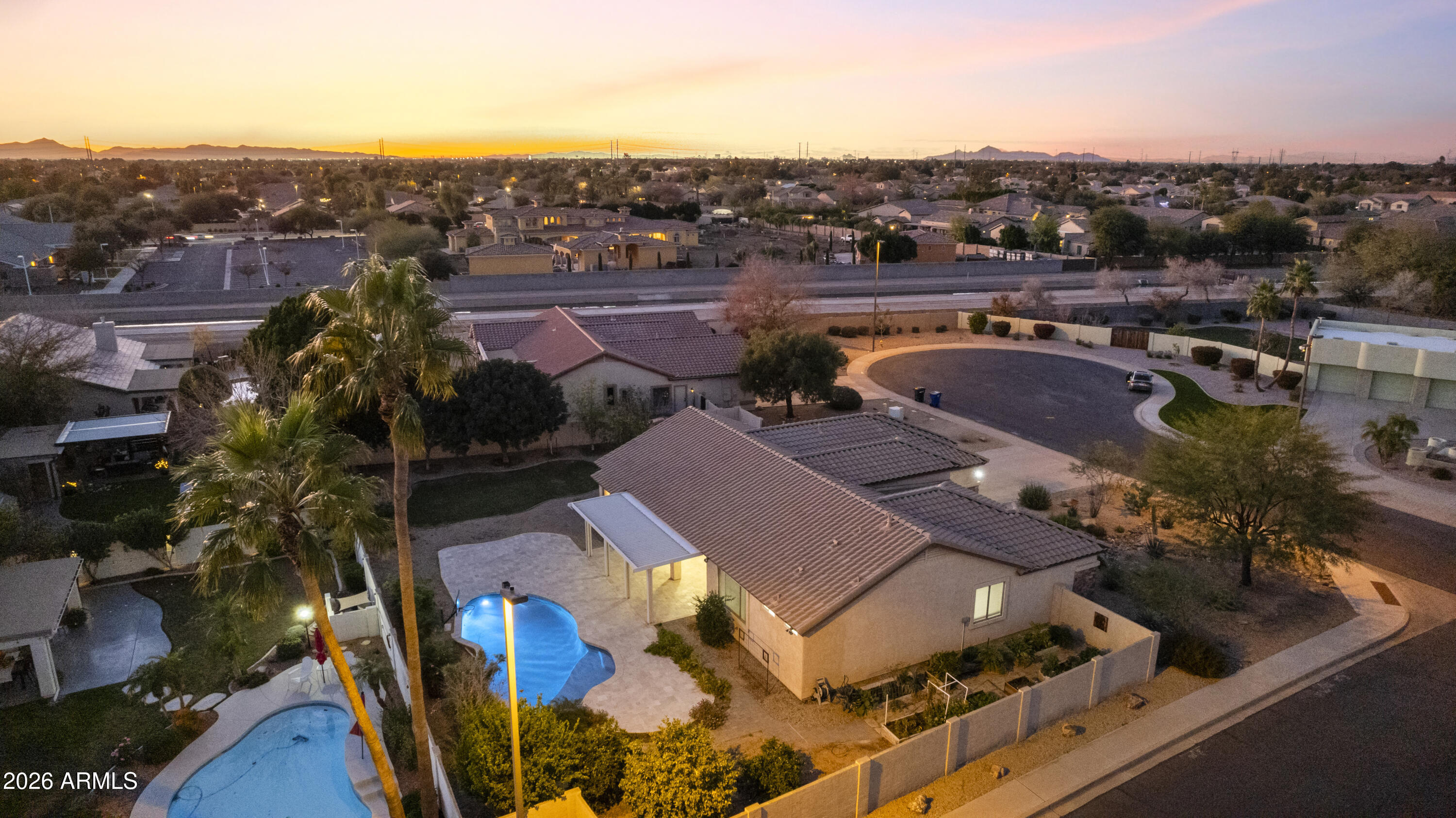 2519 East Rawhide Street Gilbert, AZ 85296 - Photo 33 of 35 an aerial view of residential houses with outdoor space