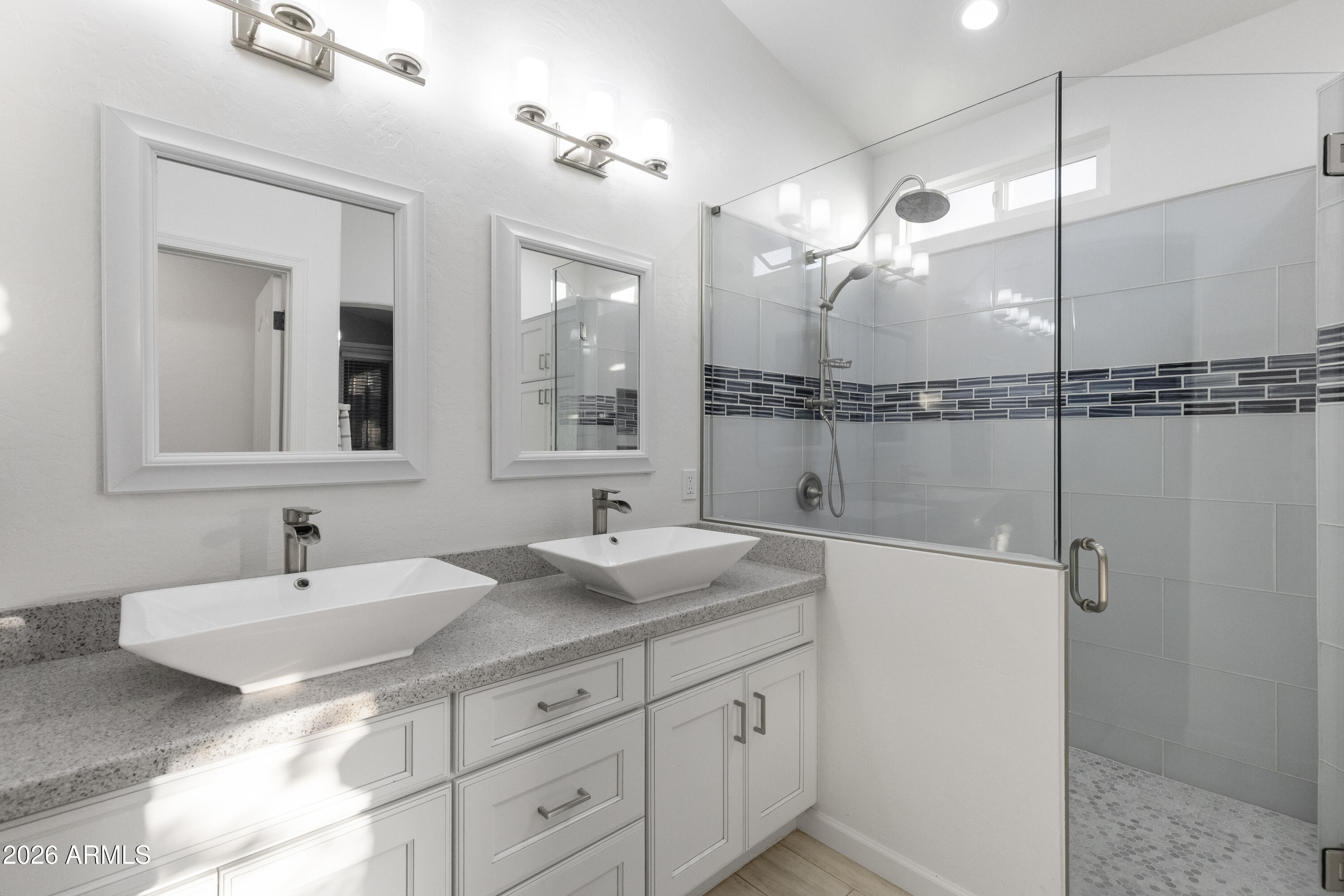 2519 East Rawhide Street Gilbert, AZ 85296 - Photo 8 of 35 a bathroom with a sink double vanity and a mirror