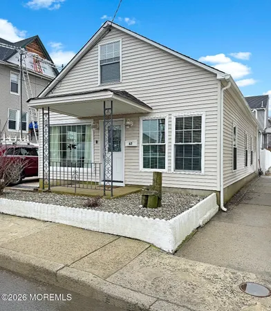 a front view of a house with a garage